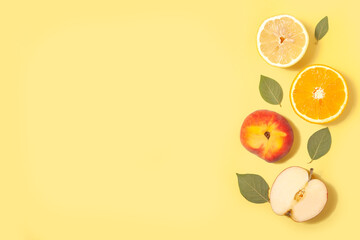 Minimalistic summer background with tropical fruits and leaves