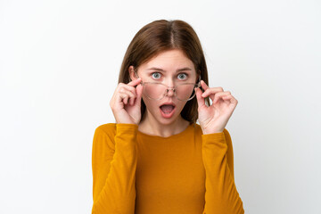 Young English woman isolated on white background With glasses and surprised expression