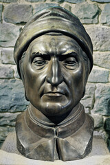 Fototapeta na wymiar Bronze bust of Italian Renaissance writer Dante Alighieri. Author of The Divine Comedy and The Inferno