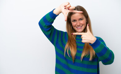 Young caucasian woman isolated on white background focusing face. Framing symbol