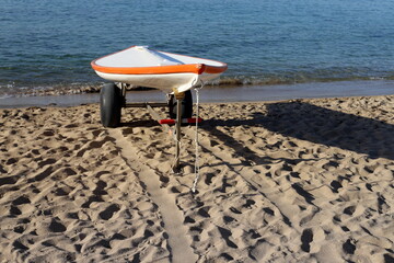 Naklejka premium Lifeguard boat on the city beach.