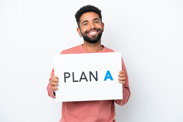 Young Brazilian man isolated on white background holding a placard with the message PLAN A