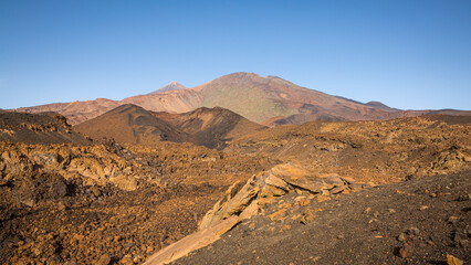 Desolate barren lava fields with the volcano El Teide in the background, UNESCO world heritage site, Tenerife, Spain