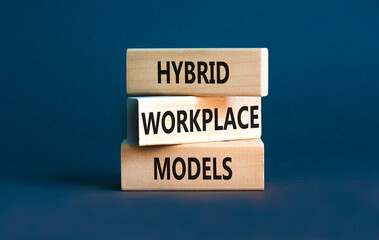 Hybrid workplace models symbol. Concept words Hybrid workplace models on wooden blocks. Beautiful...