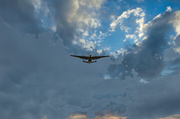 Fototapeta na wymiar Airplane seen from the ground. Air transportation. Sky 