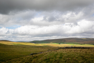 clouds over the hills