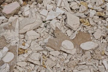 gray stone texture from pieces of broken concrete and tiles