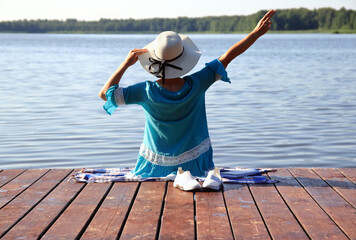 Portrait of a woman on the lake shore