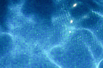 Reflections at the bottom of a pool. Water. Blue

