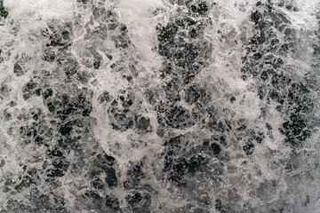 Water drops of a waterfall very close up and shart texture