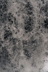 Water drops of a waterfall very close up and shart texture