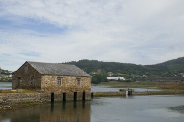 Fototapeta na wymiar Views and details of the Pol tide mill environment in Senra, Ortigueira.