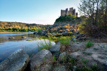 Fototapeta na wymiar Almourol Castle on an island surrounded by water, Ribatejo, Portugal