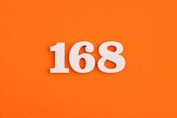 Number 168 - On orange foam rubber background