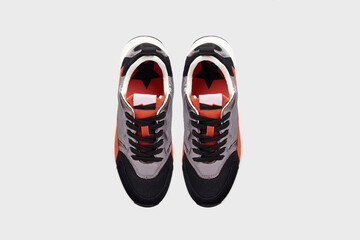 Blue orange sport women's fashion sneakers view from above. Glittering sports shoes, boots for...