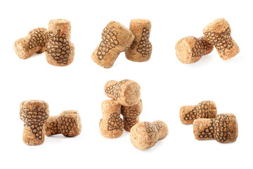 Set with corks of sparkling wine bottles on white background