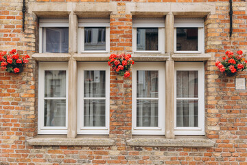 View of historic windows in Bruges, Belgium