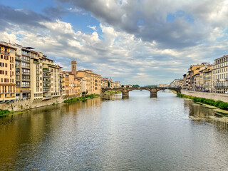 Fototapeta na wymiar Views of the St Trinity Bridge and Ponte Vecchio along the Arno River in Florence Italy