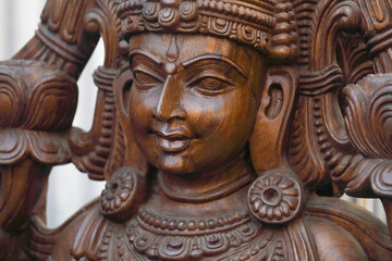 Fototapeta na wymiar Wooden statue of Hindu Goddess Lakshmi 
