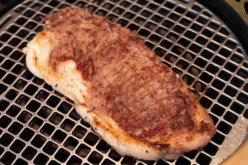 grilled steak on the grill