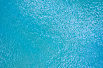 Fototapeta na wymiar Sea surface aerial view water surface texture, Turquoise sea background Beautiful nature Amazing view seascape background