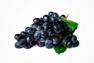 sweet black grapes on a white background