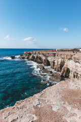 Beautiful sea caves near cape Greco in national park with turquoise water
