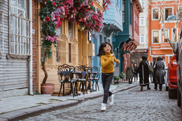 playful little girl enjoying her holiday exploring the city in istanbul turkiye