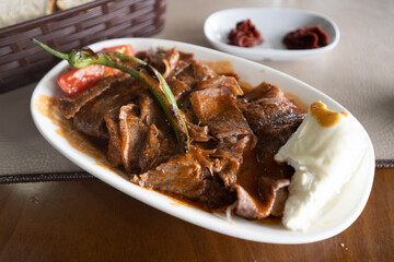 meat and meatballs, yogurt, chili and tomatoes kebab. traditional turkish delicacy