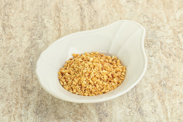 Crunched roasted peanut in the bowl