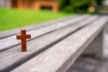 The old bench and the wooden cross