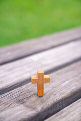 The old bench and the wooden cross