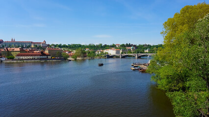 Fototapeta na wymiar View on city on Vltava river in Prague