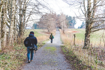 Tree lined path with people walking