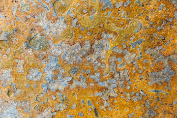 Colorful stone with orange, blue, and gray colors