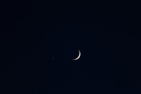 Sliver of moon with star