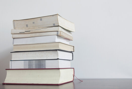 stack of books , wisdom and knowledge concept