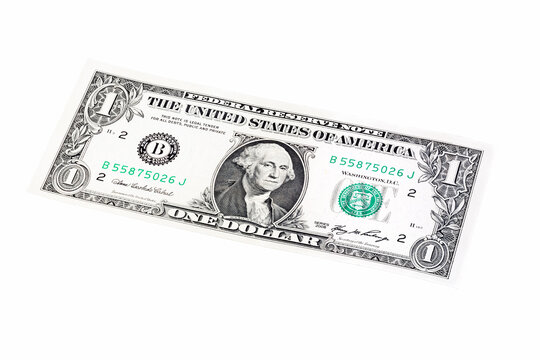 Photo of one dollar isolated on white, staked from ten photos