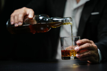 Businessmen in suits drinking  Celebrate whiskey