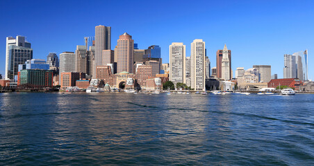 Fototapeta na wymiar Boston skyline and harbor and Atlantic Ocean on the foreground, USA