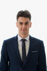 close-up portrait of Happy and look smart young  caucasian businessman wearing a dark blue suit on white background.