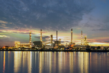 Fototapeta na wymiar Oil refinery along the Chao Phraya river at dusk.