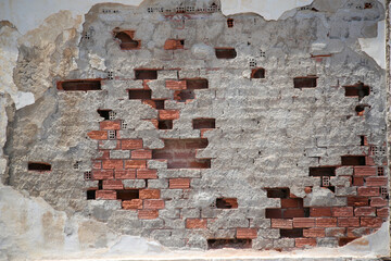 wall of old brick and old cement in andros island greece