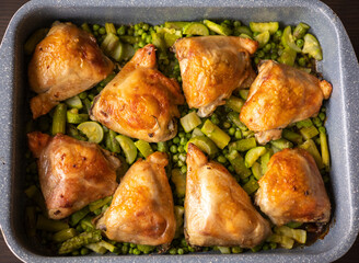 baked chicken with vegetables and herbs