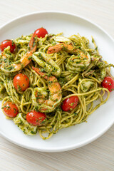 Spaghetti with seafood in homemade pesto sauce
