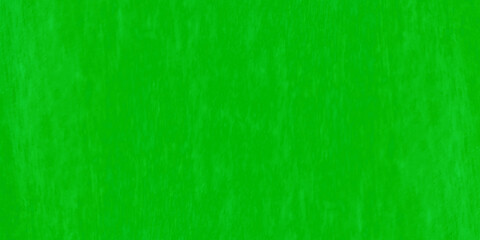 Old style green grunge texture, scratched and grainy green paper texture, Green grainy chalkboard or cardboard texture, green background with cracks and grainy stains for decoration and design.