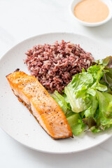 grilled salmon fillet steak with rice berry and vegetable