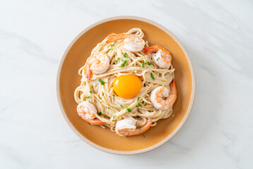 spaghetti white cream sauce with shrimps and egg yolk