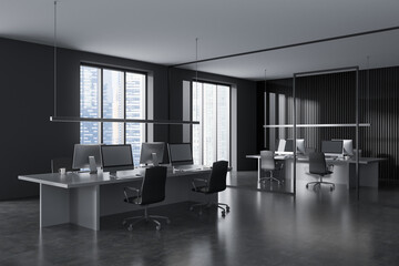 Grey business interior with coworking area and pc computers, panoramic window
