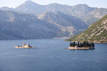 Kotor, Montenegro - July 18, 2022: Our Lady of the Rocks and Saint George Islands in the fjord en route to Kotor, Montenegro
